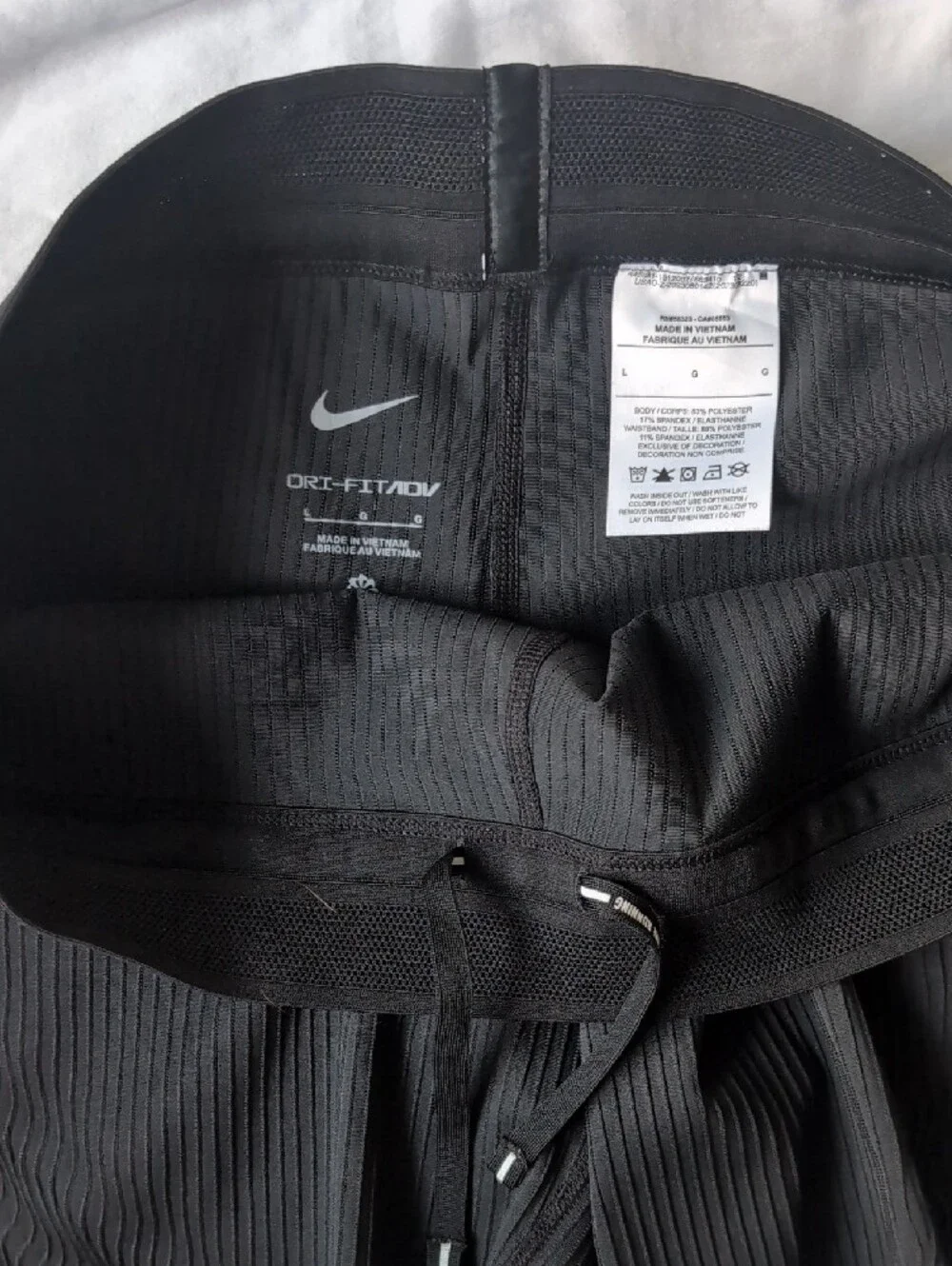 Nike Women’s Black Textured Athletic Shorts with White Swooshes